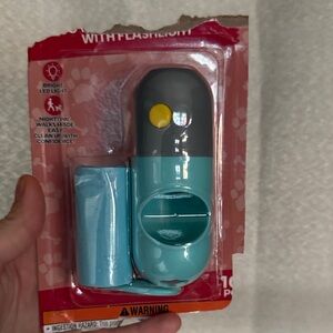 Source Unknown Teal and Gray Dog Waste Bag Dispenser with Flashlight